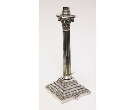 A silver plated Corinthian column table lamp engraved with the crest of Baron Villiers Stuart. H33.5cm