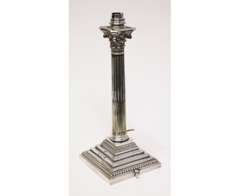 A silver plated Corinthian column table lamp engraved with the crest of Baron Villiers Stuart. H33.5cm