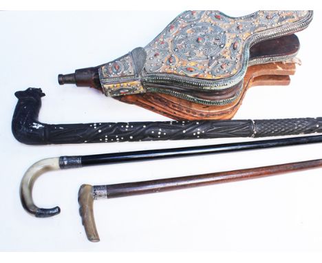 A mixed lot comprising two sets of bellows, an African walking stick and two horn handle and silver mounted walking canes