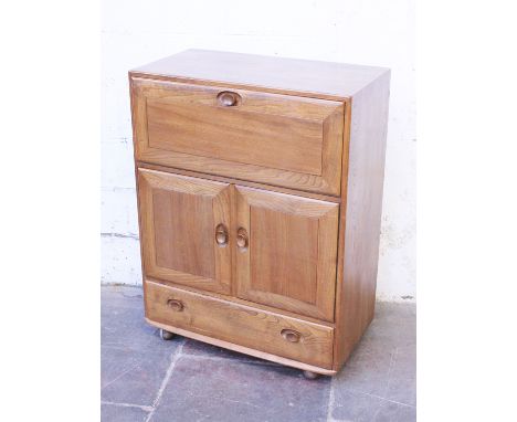 An Ercol light elm and beech bureau. W82cm D45cm H109cm