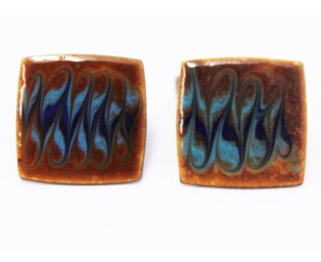 A pair of vintage Danish copper and enamel cuff links