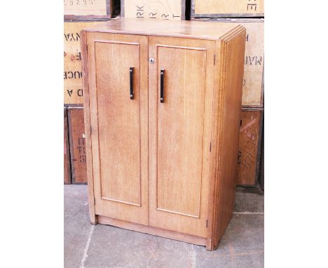 An Art Deco tall boy with drawers circa 1930. W84cm D50cm H122cm
