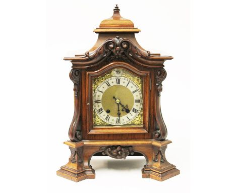 A late 19th Century walnut mantel clock the movement stamped RSM. H45cm