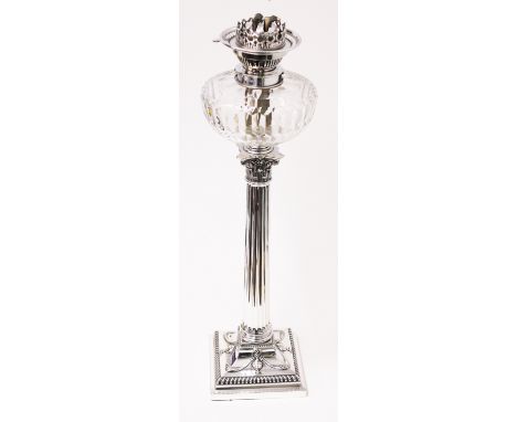 A large Neo-classical Corinthian column Mesengers Patent oil lamp. H62cm