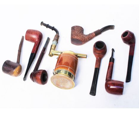 A group of eight vintage pipes