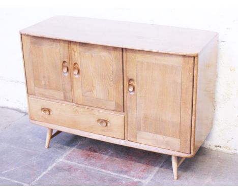An Ercol light elm and beech sideboard. W114cm D48cm H82cm