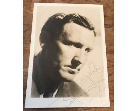 Spencer Tracy signed 7 x 5 inch sepia portrait photo. Good condition. All autographs come with a Certificate of Authenticity.