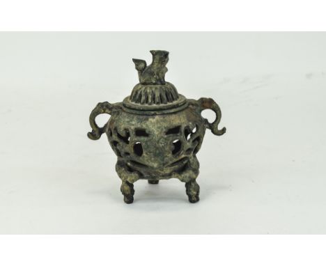 Oriental Bronzed Archaic Censer And Cover, Twin Handled Raised On Trefoil Base And Foo Dog Finial. Looks 20thC