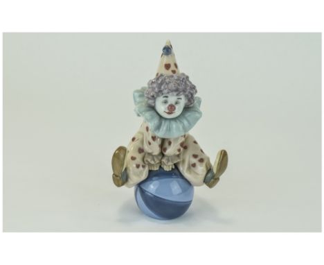 Lladro Figure "Having a ball"Model number 5813, issued 1991. Height 6.75" inches. Mint condition, boxed. 