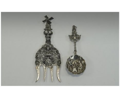 Dutch Antique and Nice Quality Silver Caddy Spoon. Elaborately decorated with figures in an interior scene. Fully marked for 