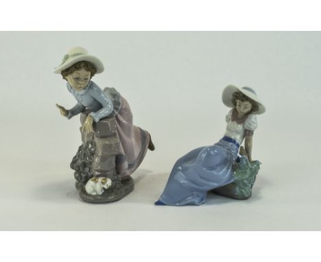 Nao by Lladro Quality Figures ( 2 ) In Total. 1/ Listening To The Bird Sing - Young Girl Sitting on a Rock. 6 Inches High. 2/