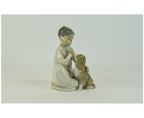 Lladro Figure ' Boy with Dog ' Model Num 4522. Issued 1970 - 1997. Height 7.5 Inches. Mint Condition. 