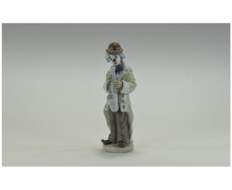Lladro Figure "Sam Sax"Model number 5471, issued 1988Height 8.5" inches, mint condition, boxed. 