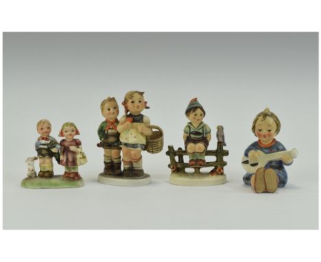 M J Hummel Figures 4 in Total. 1. Boy on a Bench 4 Inch High. 2. Boy and Girl Shopping 4.5 Inches High. 3. Girl Seated Playin