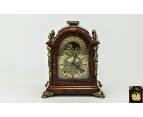 John Thomas of London - Nice Quality Walnut and Brass Mounted 8 Day Striking Moon phase Carriage / Mantel Clock, Strikes on a