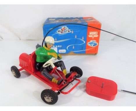 Huki - a vintage wire control go-cart by Huki made in West Germany, in original box