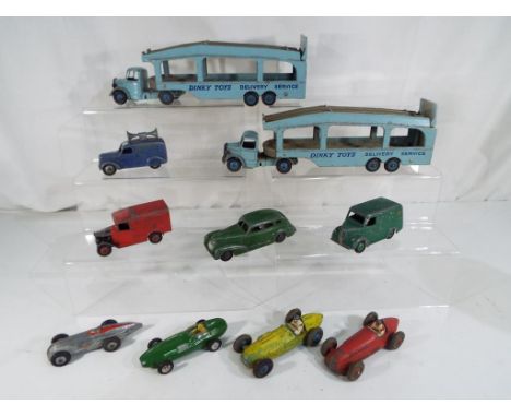 Dinky Toys - two Bedford tractors with Pullmore Car Transporters # 582 blue and marked 'Dinky Toys Delivery Service' and eigh