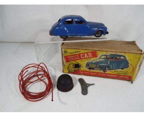 Chad Valley - a remote control tinplate Harborne car, blue, pump action steering, with key in original box