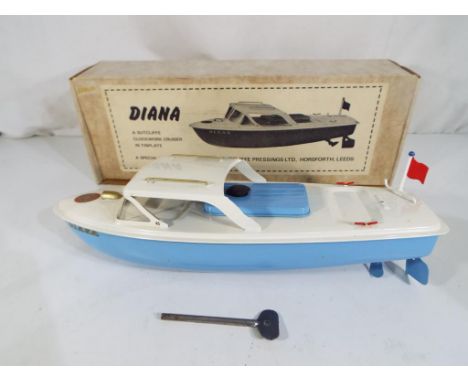 Sutcliffe Models - A Sutcliffe Models 'Diana' tinplate clockwork cruiser, produced in a limited edition, with light blue hull