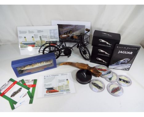 A good mixed lot to include three Atlas Editions collection Jaguar cars, The Best of British Jaguar DVD, a promotional Jaguar