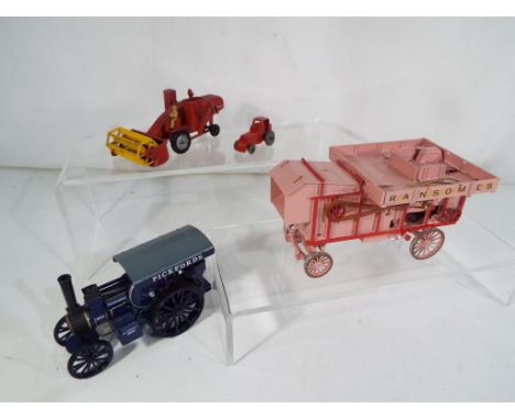 Four diecast models comprising a kit built Threshing machine bearing 'Ransomes' livery, a Corgi Fowler B6 Loco bearing Pickfo