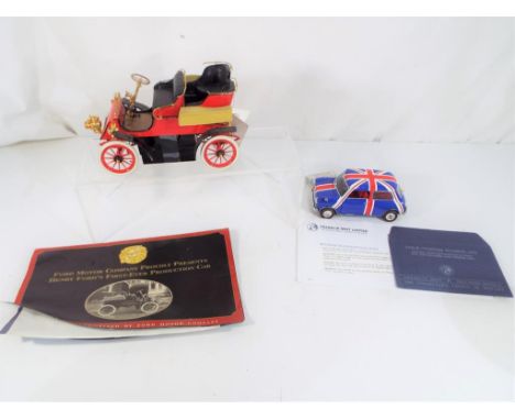 Franklin Mint - a Franklin Mint diecast model in 1:16 scale of the 1903 Ford Model A with accompanying literature and a Frank