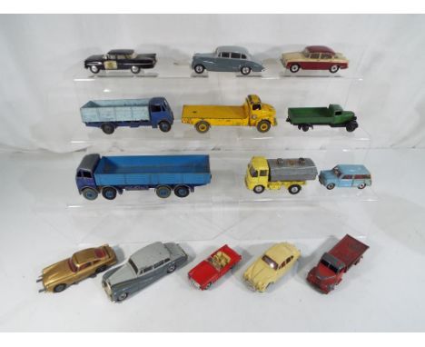 Dinky / Corgi Toys - 14 diecast models comprising bCorgi ERF model 64 Tunnel Cement, Chevrolet Impala State Patrol, James Bon