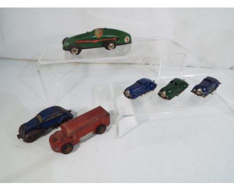 Triang Minic - a small collection of early tinplate model motor cars to include a green racing car, and an early wooden Trian