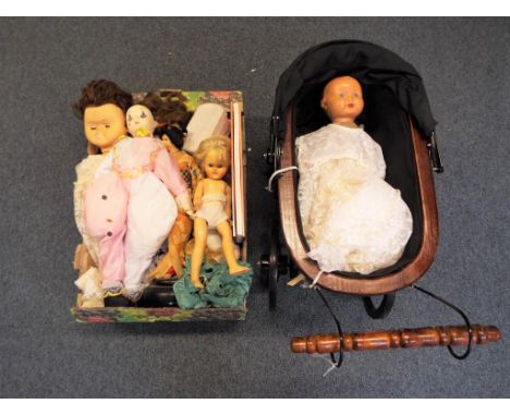 Dolls -  a quantity of vintage dolls to include a Pedigree doll and a decorative doll's pram (2)