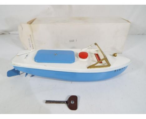 Sutcliffe Models - A Sutcliffe Models 'Tiger' clockwork speedboat with light blue hull, white deck, red bung and 'Tiger' deca