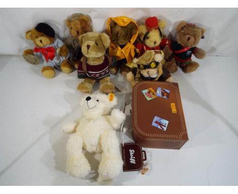 Bears - seven bears from The Teddy Bear Collection and a Steiff Bear entitled Lotte with button in ear and in model suitcase 