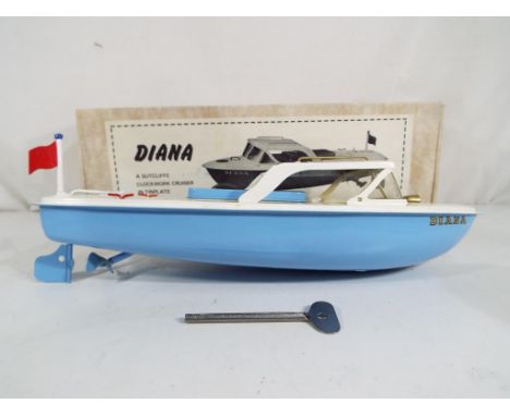 Sutcliffe Models - A Sutcliffe Models 'Diana' tinplate clockwork cruiser, produced in a limited edition, with light blue hull