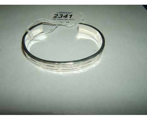 A Silver Gucci bangle, marked 925.