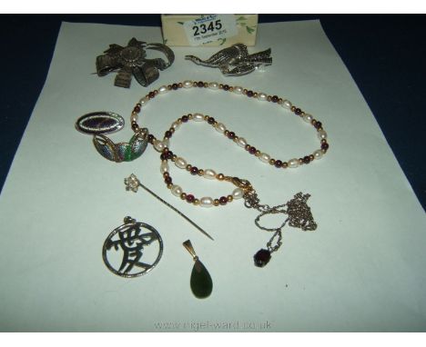 A filigree Silver Brooch, marcasite brooch, pearl and garnet necklace, Silver Chinese symbol pendant, etc.