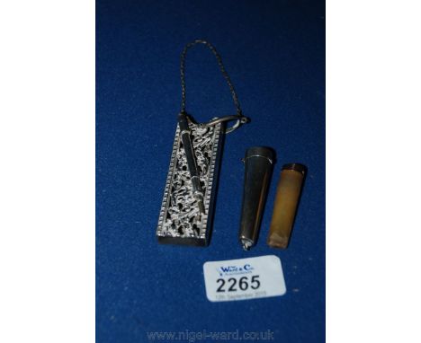 A silver Cigarette Case and holder and a silver notebook holder and pencil.
