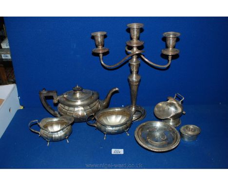 A quantity of plated items including three piece teaset and candelabra