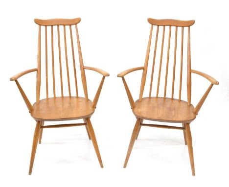 Two Ercol Goldsmith Windsor carver chairs Two Ercol model 369a beech and elm Goldsmith Windsor carver dining chairs62cm wide,