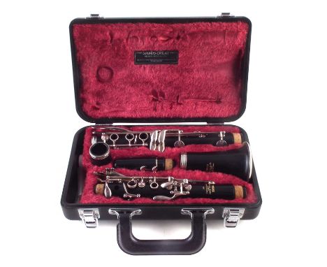 Yamaha clarinet Yamaha clarinet serial number 009189 with case and related music books.