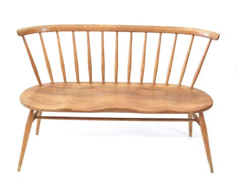 Ercol Bench Ercol beech and elm model 450 'Love Seat', two seater bench, spindle back with a curved moulded rail over a twin 