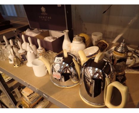 Shelf of mixed ceramics and glass to inlcude Veritas bone china tea set and Bossons figurine heads 