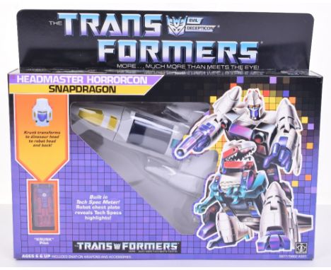 Boxed Hasbro G1 Transformers Headmaster Horrorcon ‘Snapdragon’ 1986 issue, transforms from jet to dinosaur to robot and back!