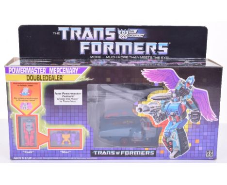 Boxed Hasbro G1 Transformers Powermaster Mercenary ‘Doubledealer’ 1987 issue, transforms from missile carrier to robot to fal