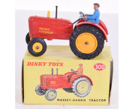 Dinky Toys 300 Massey Harris Tractor, red body, yellow plastic front wheel hubs, yellow metal rear hubs, blue plastic driver,