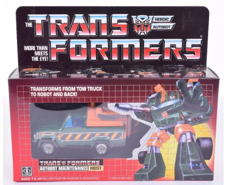 Boxed Hasbro G1 Transformers Autobot Maintenance ‘Hoist’ 1985 issue, transforms from tow truck to robot and back in mint boxe