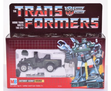 Boxed MB G1 Transformers Autobort Scout Hound 1985 Milton Bradley issue, transforms from 4 WD vehicle to robot and back. In m