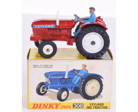 Dinky Toys 308 Leyland 384 Tractor, metallic red body, white plastic front wheel hubs, white metal rear hubs, blue plastic dr