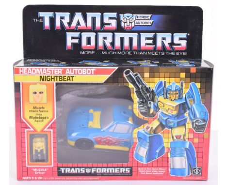 Boxed Hasbro G1 Transformers Headmaster Autobot ‘Nightbeat’ 1987 issue, transforms from race car to robot and back again! In 