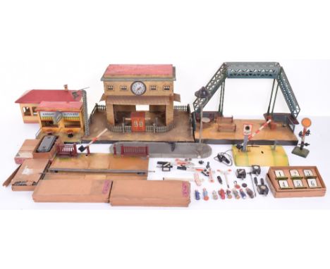 German 0 gauge Kibri and Marklin tinplate track side buildings and accessories, circa 1930, Kibri Station with clock, picket 