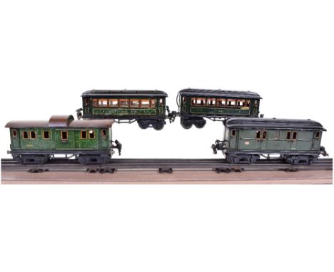 Marklin four 0 gauge bogie coaches with lighting, circa 1930, two 18880 2nd/3rd, hinged doors and roof, one good condition sl