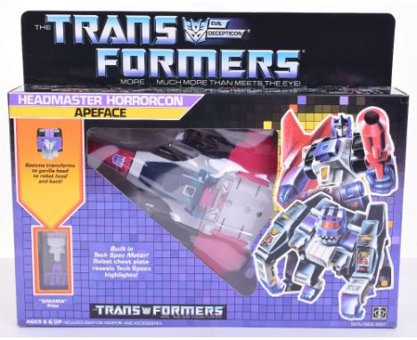 Boxed Hasbro G1 Transformers Headmaster Horrorcon ‘Apeface’ 1986 issue, transforms from jet to gorilla to robot and back! In 